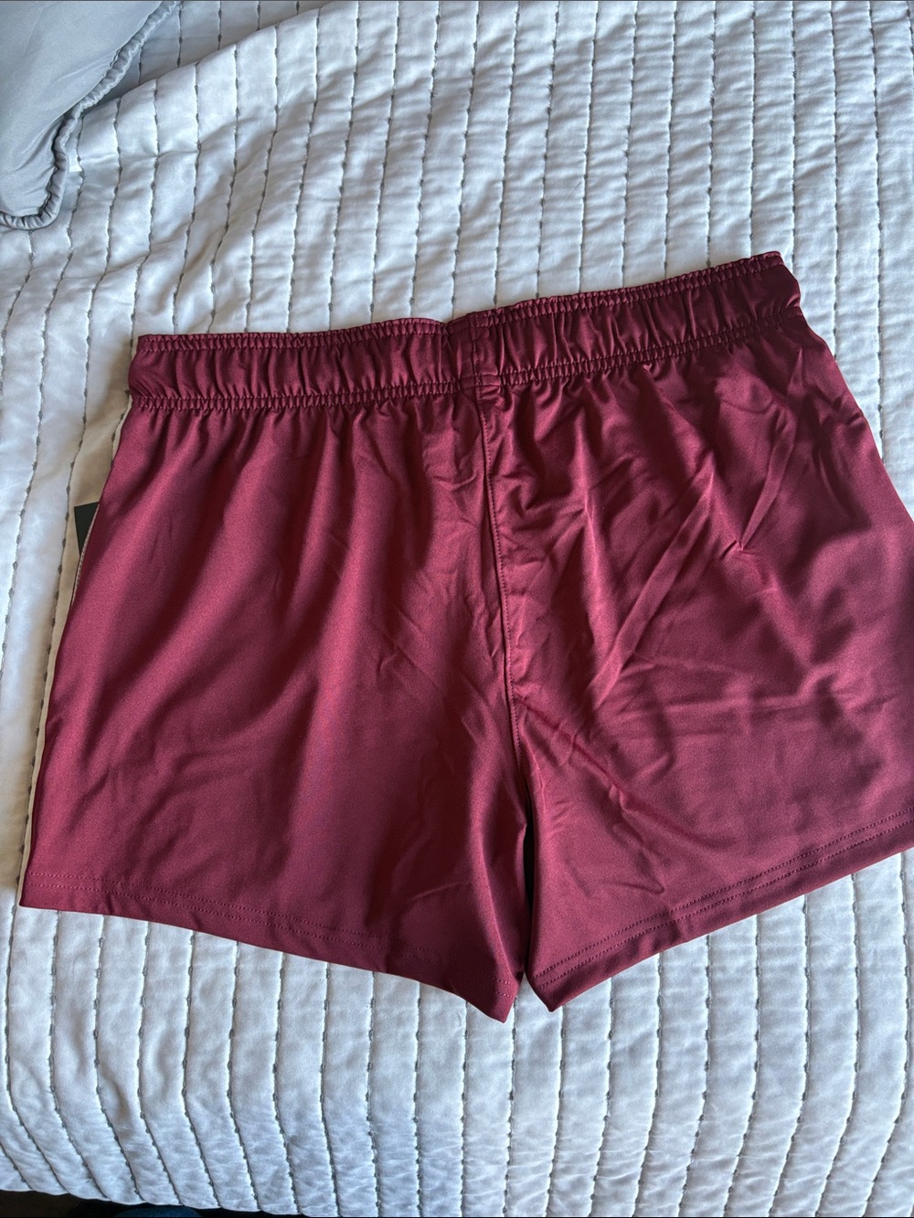 New Balance Women's Maroon Running Shorts 4 inch with inseam and pockets - Picture 5 of 5